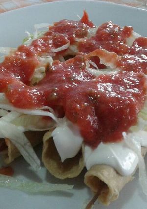 A picture of Crispy Beef Taquitos.