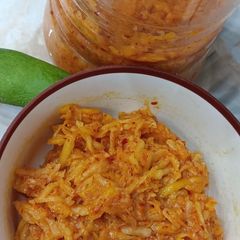 A picture of Raw Mango Lachchha pickle with chilli Asafoetida (hing).