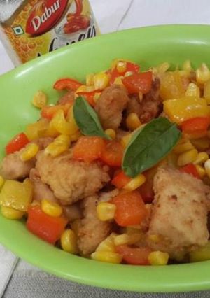 A picture of Crumb fried chicken with veggies.