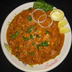 A picture of Dahi Chicken Curry.