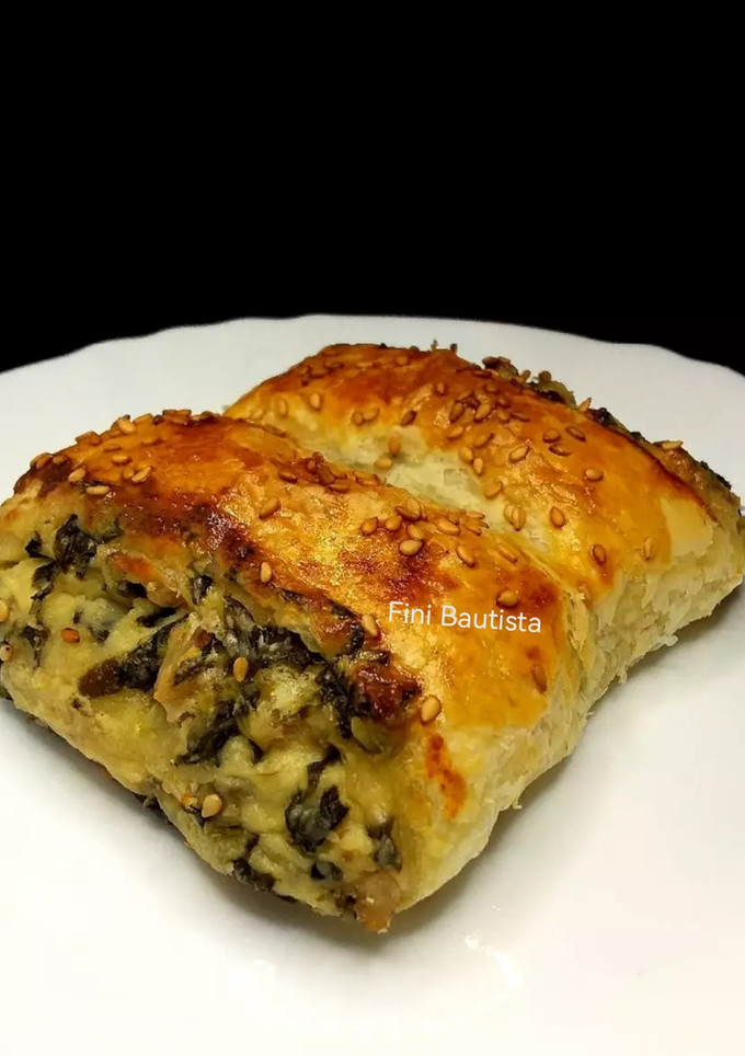 Una foto de Hojaldre relleno de espinacas y queso de rulo