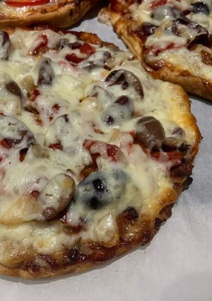 Une photo de Pizza au porc effiloché fumé
