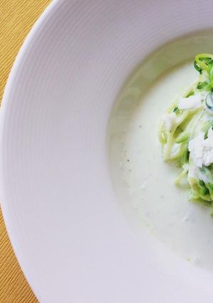 A picture of Zucchini Noodles (Zoodles) with Greek Sauce.