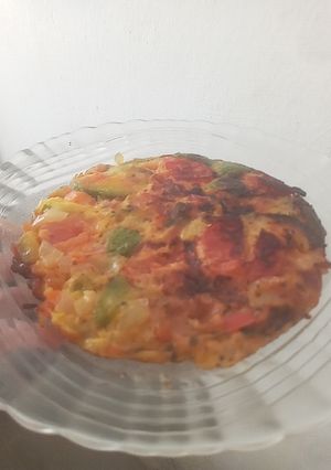 Una foto de Tortilla de zapallito y tomate
