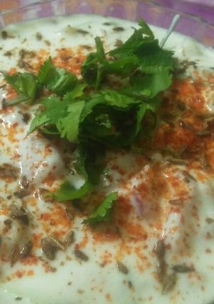 A picture of Roasted peanuts and tomato raita.