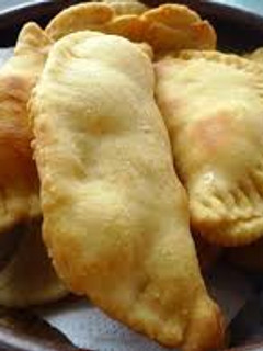 Una foto de Empanadas fritas de queso y camarón