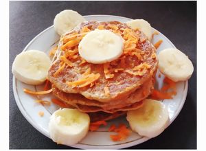 Una foto de Pancakes veganos de zanahoria saludables.🥕