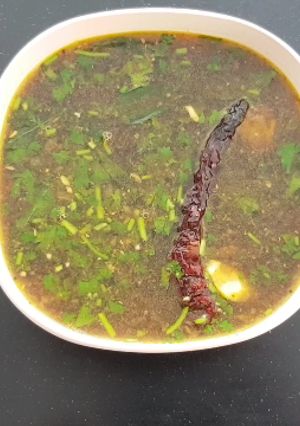 A picture of Tamarind Rasam.