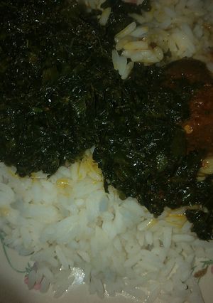 A picture of White rice and local soup.
