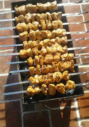 A picture of Grilled Shish Tawook on Charcoal.