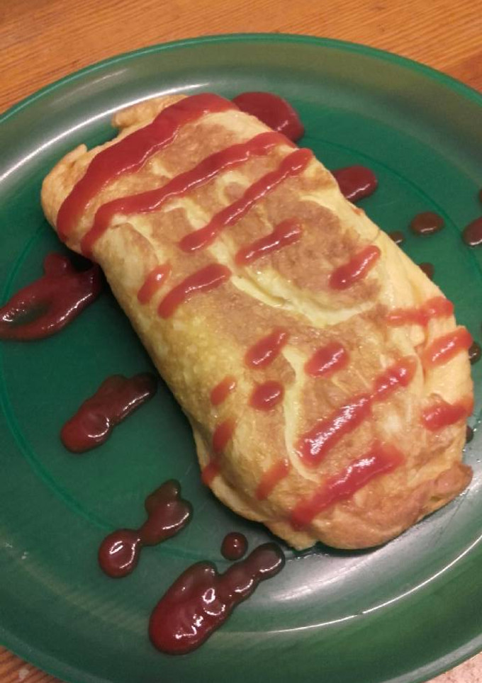 Una foto de Omelette con sorpresa de salchicha