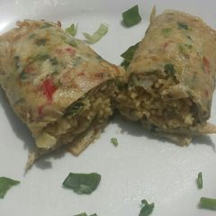 A picture of Noodles in omelette wrap.