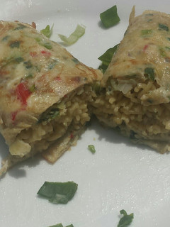 A picture of Noodles in omelette wrap.