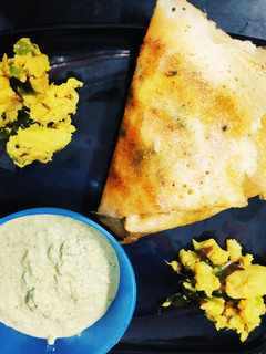 A picture of Stuffed Hara Masala Dosa.