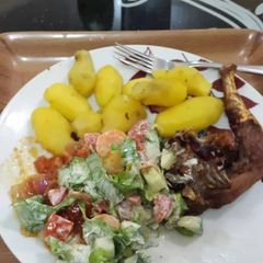 A picture of Boiled potatoes,fried chicken and salad.