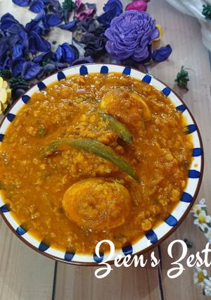A picture of Zambre Thool Teh Daal/Kashmiri Fried Eggs with Bengal Gram.