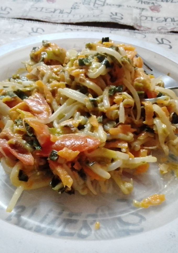 Una foto de Salteado de Brotes y Tomates Cherry