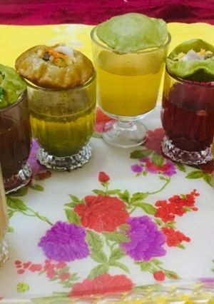 A picture of Panipuri (7 types of water with 4 flavour  of  puries).