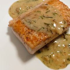 A picture of Salmon with apple and herb beurre blanc.