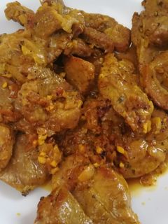 Una foto de Filete de cabezada de cerdo en salsa de vino