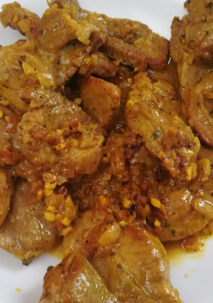 Una foto de Filete de cabezada de cerdo en salsa de vino