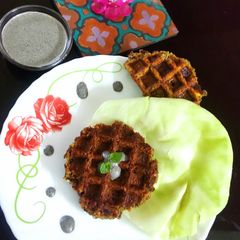 A picture of Waffle Falafel with Black Sesame Tahini Sauce.