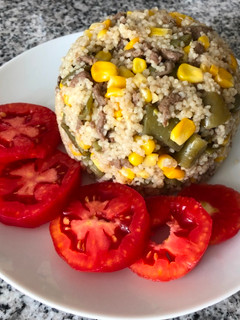 Una foto de Couscous con porotos verdes y choclo