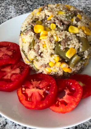 Una foto de Couscous con porotos verdes y choclo