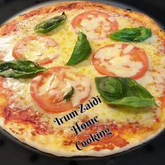 A picture of 🍕🌿Pizza Margherita 🌿🍕(Tomato, Basil, and Mozzarella Pizza).