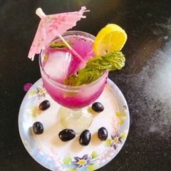 A picture of Black plum 😋 / Java plum (jamun) mojito 😋🥤.
