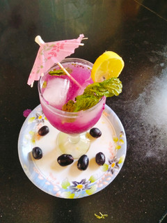 A picture of Black plum 😋 / Java plum (jamun) mojito 😋🥤.