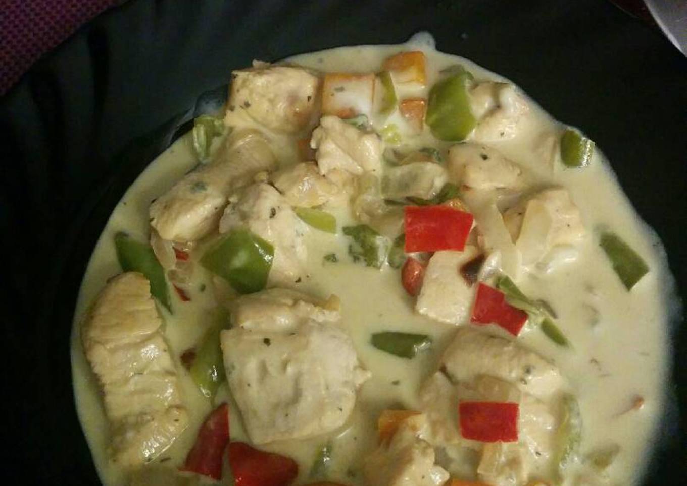 Pollo cuatricolor
