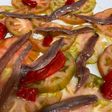Carpaccio de tomate raff con anchoas del Cantábrico