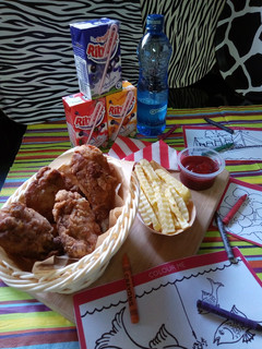 A picture of #THE BIG FIVE#KIDS MENU Kuku Kikapu with Curly Chips.