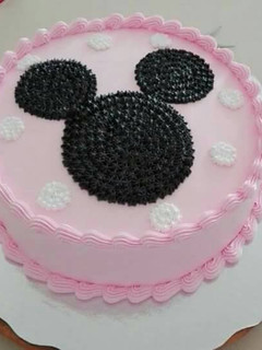 Una foto de Pastel de chocolate de minnie mouse