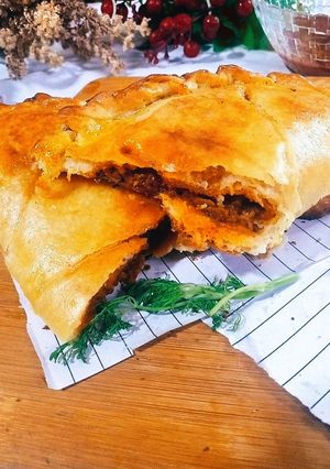 A picture of Spicy lal Mirch Qeema calzone.