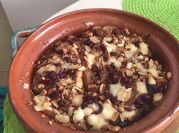 A picture of roasted peanuts and almonds