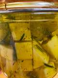 Queso en aceite aromatizado