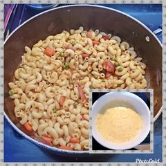 Red veggies pasta with white sauce A picture of Red veggies pasta with white sauce.
