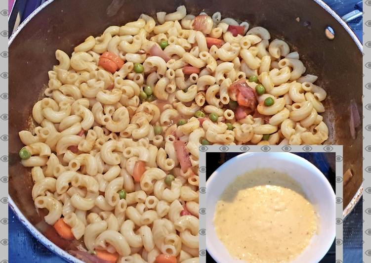 Red veggies pasta with white sauce