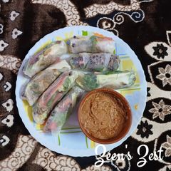 A picture of Vietnamese Rice Paper Rolls with Peanut Sauce.