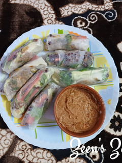 A picture of Vietnamese Rice Paper Rolls with Peanut Sauce.
