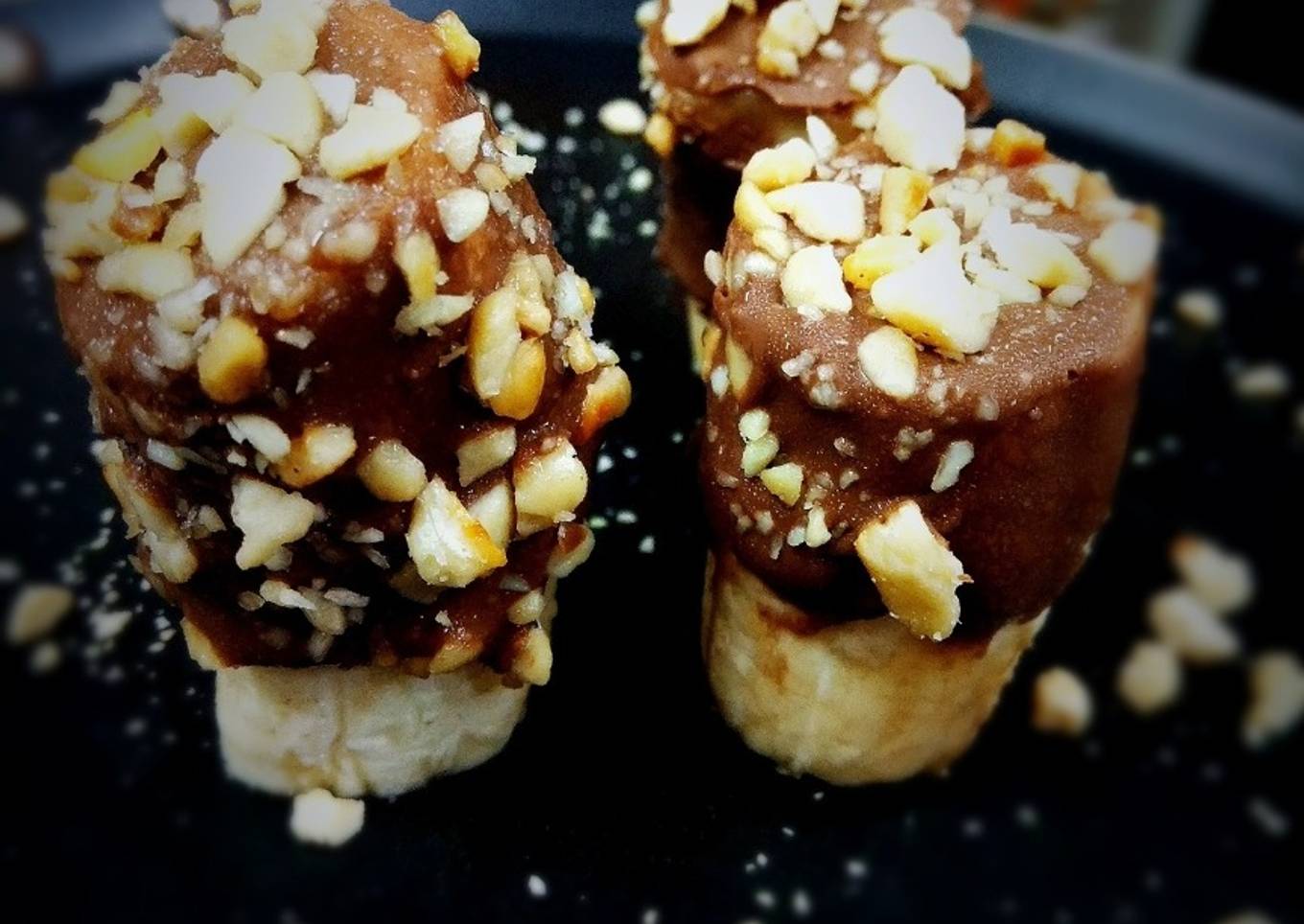 Peanut chocolate dunked bananas
