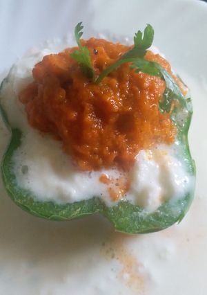 A picture of Malai kofta in capsicum bowl.