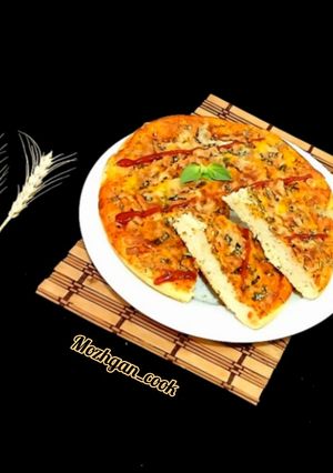 عکسی از دستور پیتزا مارگاریتا با ریحان خشک