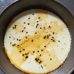 A picture of Steam Eggs with Sesame Seeds.