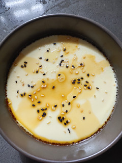 A picture of Steam Eggs with Sesame Seeds.