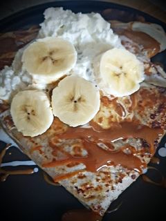 Una foto de Crepes de Dulce de leche y plátano