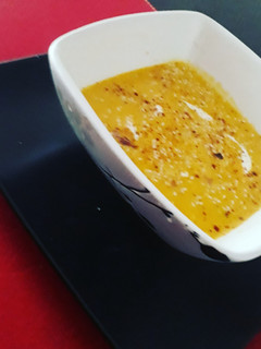 Una foto de Crema de zapallos y cebolla