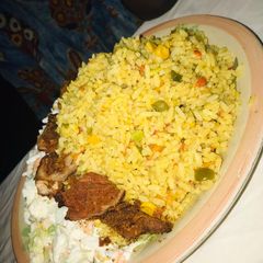 A picture of Title: coconut rice and salad.